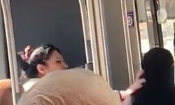Halk otobüsünde tesettürlü kadına hakaret eden kadın gözaltına alındı