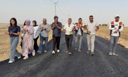 Midyat’ta 50 yıl sonra mahallelerine dönen Yezidiler, asfalt sevincini halayla kutladı