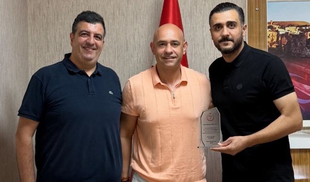 Mehmet Hakkı Yıldız'a Başarı Plaketi