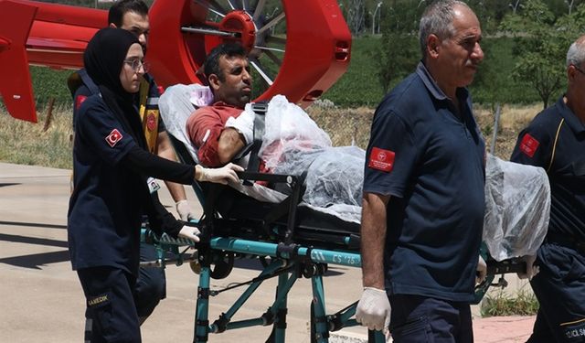 Çim biçme makinesine kolunu kaptırdı, ambulans helikopterle sevk edildi
