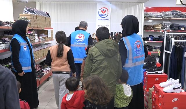 Yüzlerce yetime kışlık giyim yardımında bulunuldu