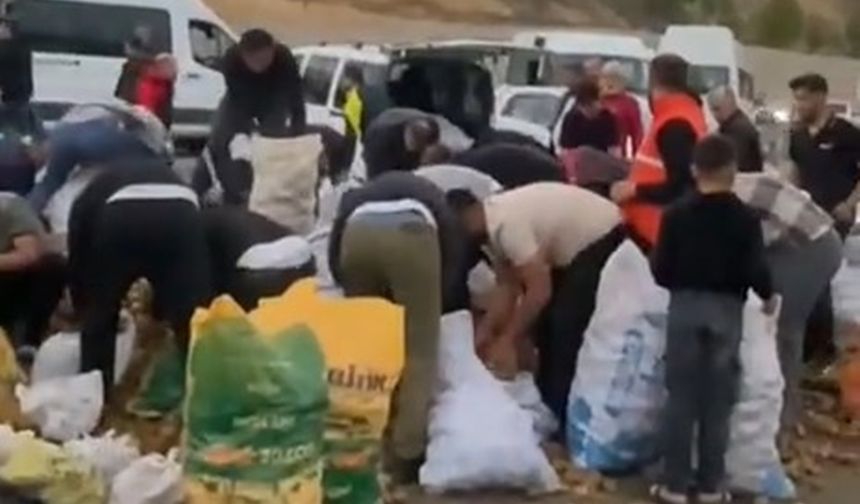 Arızalanan kamyonetindeki patatesleri ücretsiz dağıttı